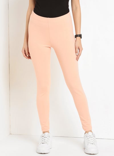 Buy Elastic Waist High-Rise Skinny Fit Plain Leggings Peach in Saudi Arabia