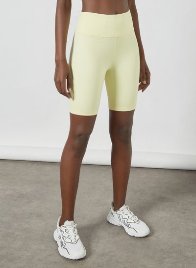Buy Elasticated Sports Shorts Pastel Yellow in UAE