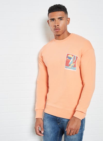 Buy Graphic Print Sweatshirt Coral in Saudi Arabia