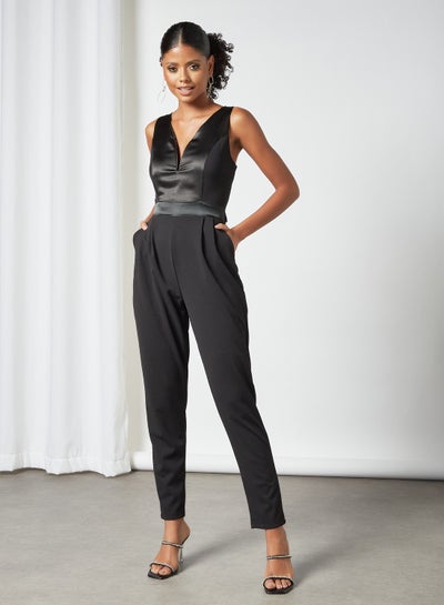 Buy Plunge Neck Padded Back Tie Jumpsuit Black in UAE