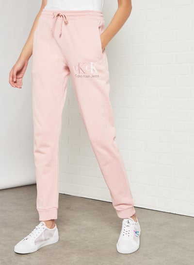 Buy 90's Logo Sweatpants Pink in UAE