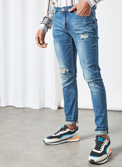 اشتري Men's Slim Fit Distressed Jeans أزرق في الامارات