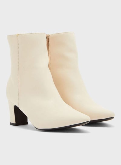 Buy Block Heel Ankle Boots Beige in Saudi Arabia