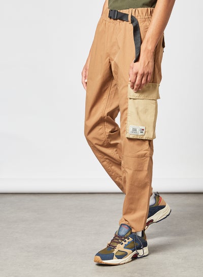 Beige Large distressed cotton-ripstop cargo trousers