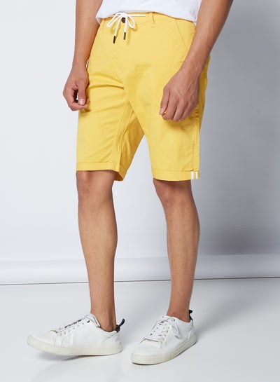 Buy Solid Chino Shorts Yellow in Egypt