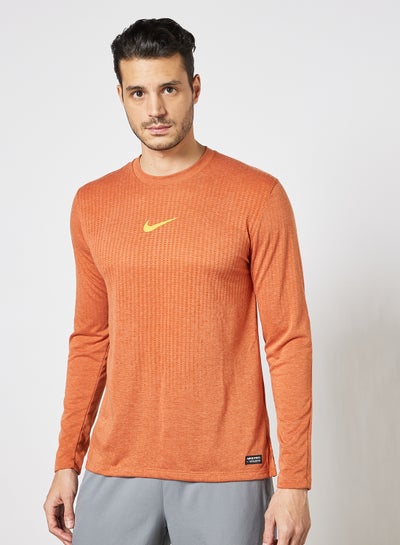 اشتري Pro Dri-FIT ADV Training Top Orange في السعودية