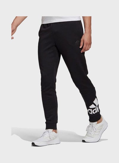 Buy Essential Logo Sweatpants Black in Saudi Arabia