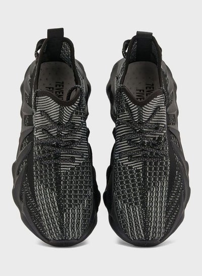 Buy Spider Sole Knitted Sneakers Black in Saudi Arabia