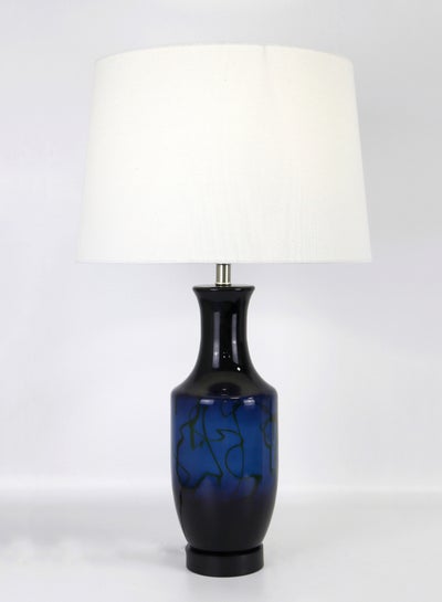 اشتري مصباح طاولة زجاجي مصنوع من مواد عالية الجودة بتصميم فاخر ومميز وعصري ليضفي لمسة أنيقة ومثالية على ديكور المنزل، مقاس 15 × 25.5 سم، طراز RSN71022، لون أزرق في السعودية