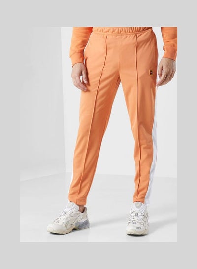 Buy Heritage Sweatpants Orange in UAE