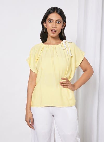 Buy Women's Solid Design Casual Short Sleeve Top Yellow in Saudi Arabia