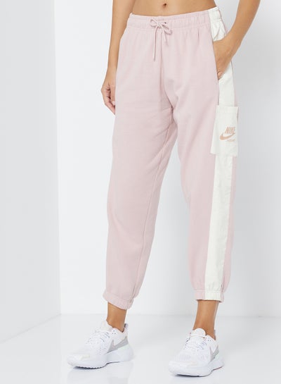 اشتري NSW Fleece Heritage Sweatpants Pink في السعودية