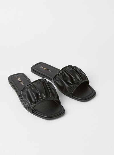 Buy Kenora Ruffles Detail Flat Sandals Black in Saudi Arabia