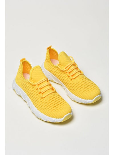 Buy Women's Textured Detail Lace-Up Closure Low Top Sneakers Yellow in Saudi Arabia