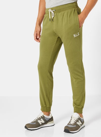 Buy Eco-Friendly Essential Sweatpants Olive in Saudi Arabia